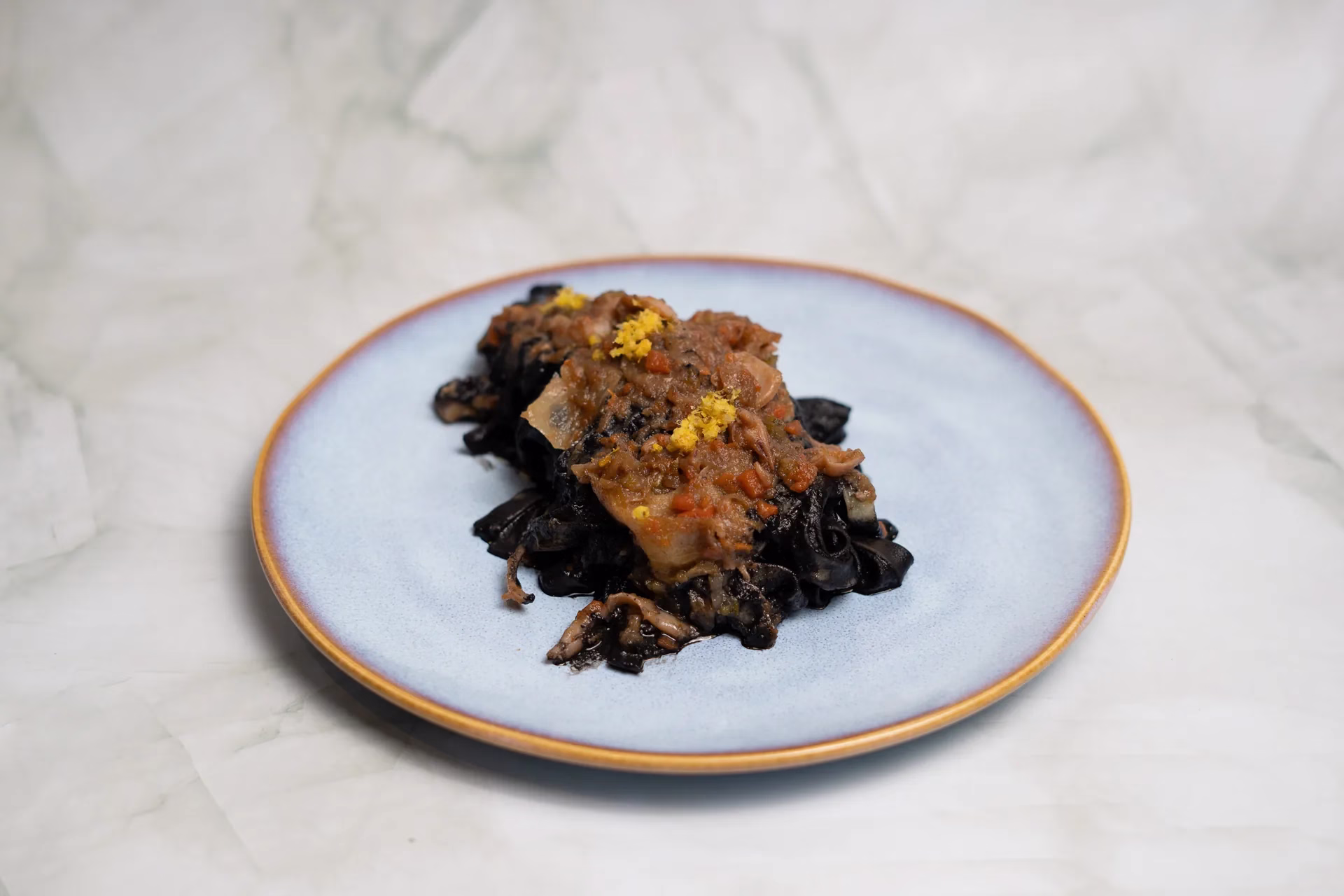 Tagliatelle al nero Origini restaurant italien Paris